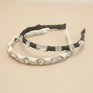 Detailed view of Baroque crystal headbands with satin fabric and sparkling rhinestones