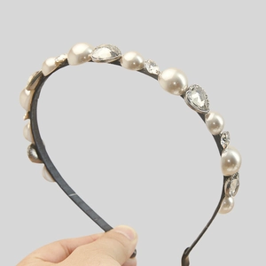 Elegant vintage pearl and heart crystal headband with a slim dark band for women