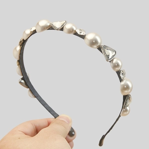 Elegant vintage headband with white faux pearls and crystal rhinestones on black frame