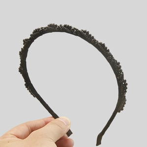 Fashionable black beaded headband with sparkling faceted rhinestones for a daily hair accessory