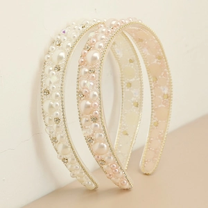 Detail of two-piece baroque headband set with pearls and rhinestones on gold base