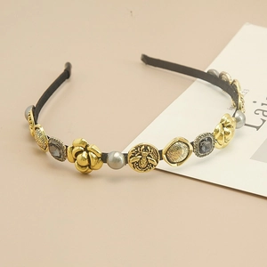 Vintage baroque headband with gold camellia, bee, pearls and rhinestones on black band