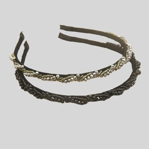 Detail of two-piece beaded headbands in gunmetal black with hand-sewn crystals