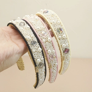 Elegant wide headband set with pearls and crystals in black, pink, and ivory colors