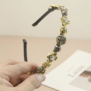Baroque retro headband featuring vintage gold ornaments with pearls and crystals