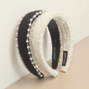 Detailed close-up of handmade tweed headband featuring sequins and imitation pearls