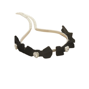 Vintage velvet bow headband with heart-shaped rhinestones for an elegant hair look