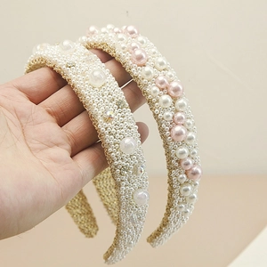 Elegant wide pearl headbands with gold woven base featuring white and pink pearls