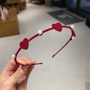 Elegant red flocked headband with heart details and white faux pearls for women