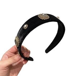 Retro black velvet padded headband with vintage rhinestone accents for women hair styling