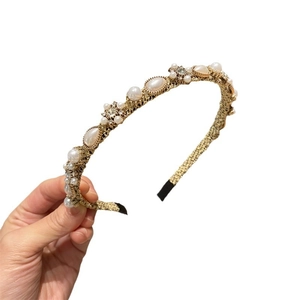 Elegant vintage floral pearl headband with rhinestones and gold braided metal wire detail