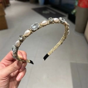 Vintage palace style headband with white pearls and sparkling crystals on gold frame