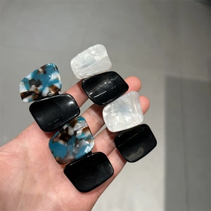 Elegant tortoiseshell hair clip set in blue, black and pearl white resin for women