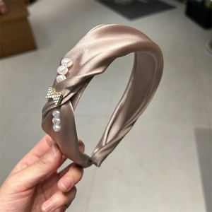 French vintage champagne satin headband with pearls and a rhinestone bow ornament