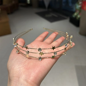 Three-layer gold metal headband featuring sparkling star ornaments and clear rhinestones