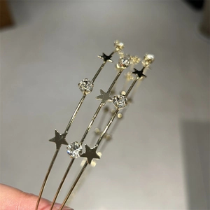 Three-layer gold star headband with sparkling rhinestones and minimalist metal finish