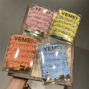 Set of four colorful high-elastic pleated hair scrunchies in elegant transparent gift box