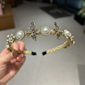 Elegant gold metal headband with large pearls, crystal rhinestones and bee charms