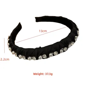Detail view of crystal and pearl headband with measurements 13cm diameter and 2.2cm width