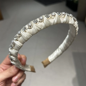 Elegant ivory satin headband with sparkling crystals and pearls for high crown hair styling