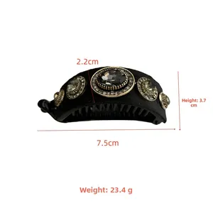 Detailed view of banana hair clip dimensions 7.5cm with rhinestones and velvet finish