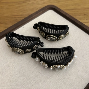 Three-piece banana hair clip set with elegant pearls and sparkling rhinestones for women