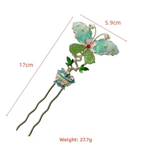 Detail view of U-shaped hair stick showing enamel butterfly dimensions 17cm and 5.9cm