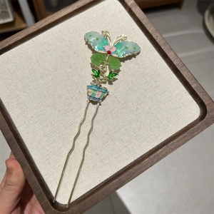 Traditional Chinese gold butterfly hair pin with colorful enamel and floral details