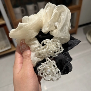 Elegant organza scrunchies with faux pearl camellia flowers in black and beige