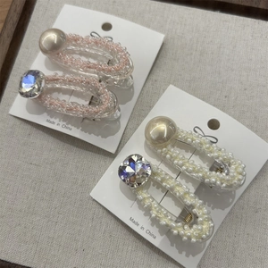 Set di 4 eleganti fermagli per capelli con perle e cristalli in resina per donna
