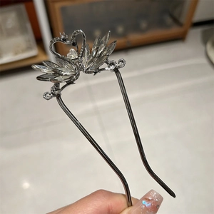 Elegant swan hair fork with sparkling zircon crystals in vintage gunmetal finish