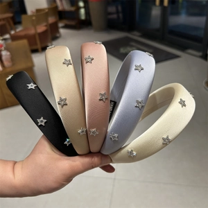 Cerchietti imbottiti con strass a stella in vari colori con finitura in seta elegante