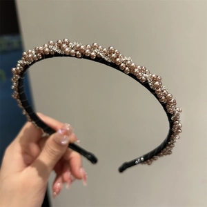Serre-tête élégant orné de perles et strass sur monture noire fine pour femmes
