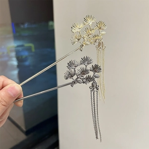 Traditional pine needle hairpins with metallic tassels in gold and silver finishes