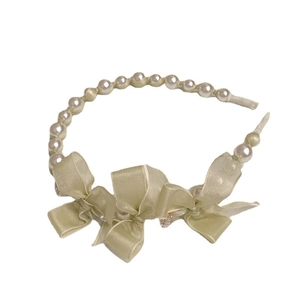 Elegant white faux pearl headband featuring light green chiffon bows and rhinestone details