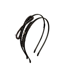 Serre-tête élégant en cristal noir avec nœud en strass et motifs de vigne fins