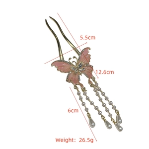 Detail view of pink butterfly hair pin with pearls and tassel, size 5.5cm by 12.6cm