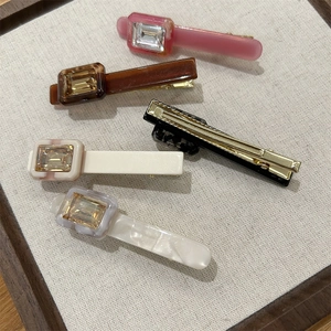 Collection of acetate rectangle hair clips with crystals in various colors and golden base