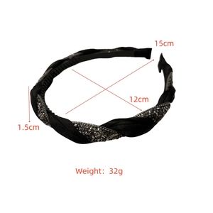 Detail view of black braided headband with crystals showing 1.5cm width and dimensions