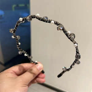 Minimalist black crystal headband with grey faceted stones and white imitation pearls