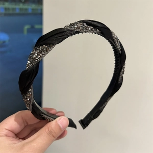 Braided black satin headband with grey rhinestones and non-slip teeth for women