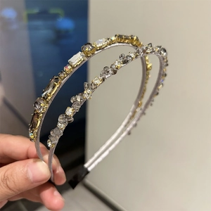 Detail of two layered crystal headbands with rectangular and round rhinestones