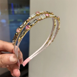 Double layered crystal zircon headbands in pink and grey for a modern elegant hairstyle