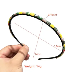 Detail view of colorful bead headband showing dimensions 12cm by 14cm and 14g weight
