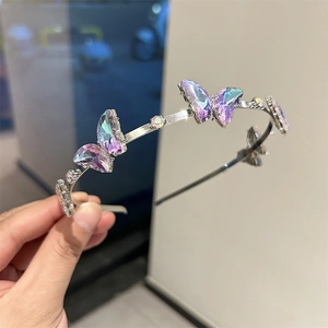 Serre-tête papillon argenté élégant avec cristaux violets dégradés et strass brillants