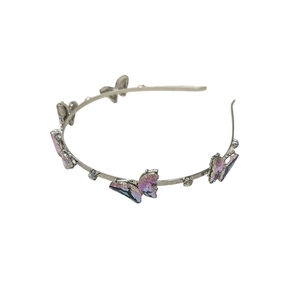 Serre-tête élégant en métal argenté avec cinq papillons en cristal violet et strass brillants