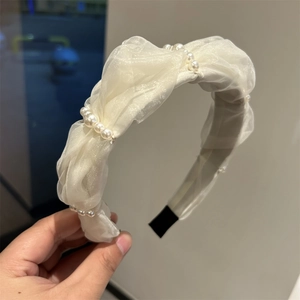 Elegant ivory organza headband with woven pearls and pleated fabric for women