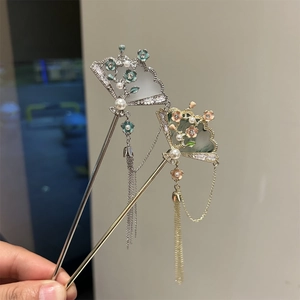 Detail of Chinese fan hairpins with floral enamel, pearls, and long metal tassels