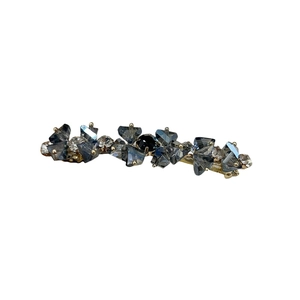 Fermaglio per capelli con cristalli blu e trasparenti su base in metallo dorato