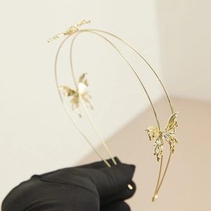 Elegante gouden dubbellaagse vlinder haarband met fonkelende strass kristallen